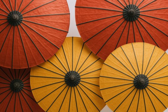 Vibrant Traditional Umbrellas: A Kaleidoscope of Color and Asian Culture, Perfect for Backgrounds and Artistic Compositions