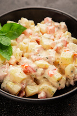Potato salad ham, potato, tomato, carrot, mayonnaise tasty snack fresh delicious gourmet food background on the table rustic top view copy space