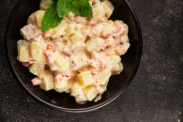 Potato salad ham, potato, tomato, carrot, mayonnaise tasty snack fresh delicious gourmet food background on the table rustic top view copy space