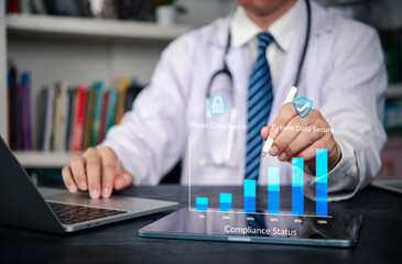 Fototapeta premium HIPAA, compliance Doctor uses tablet and laptop patient data security and privacy in EHR, charting audit, governance, and encryption progress toward 100%. concept healthcare protection workflow.