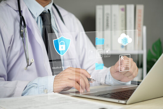 EHR, cybersecurity, Doctor uses a laptop clinic to secure cloud medical records and data privacy, security and patient care with digital workflows. concept trusted protection and compliance.