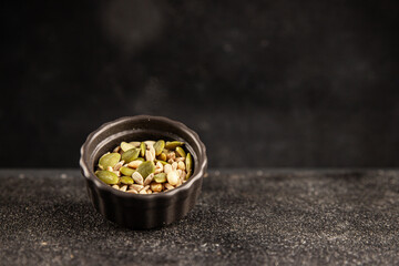 Seed mix sunflower seeds and pumpkin seeds natural product tasty snack fresh delicious gourmet food background on the table rustic top view copy space keto and paleo diet vegan and vegan food