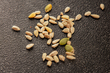 Seed mix sunflower seeds and pumpkin seeds natural product tasty snack fresh delicious gourmet food background on the table rustic top view copy space keto and paleo diet vegan and vegan food