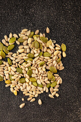 Seed mix sunflower seeds and pumpkin seeds natural product tasty snack fresh delicious gourmet food background on the table rustic top view copy space keto and paleo diet vegan and vegan food