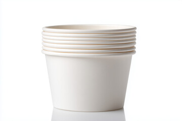 Stack of brown kraft paper cups standing upright on a plain surface. Eco-friendly disposable drinkware commonly used for coffee, tea, and takeout beverages, isolated on a white background.
