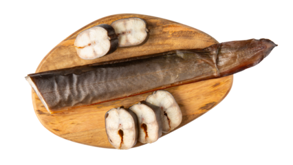 Smoked eel on wooden board isolated on white background. Fish delicacy ready to eat. Fish tail. Top view.