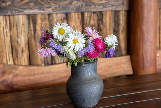 colorful flowers in a vintage basket - Powered by Adobe