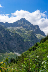Fototapeta premium Majestic mountain peak dominating the Georgian landscape under a cloudy sky