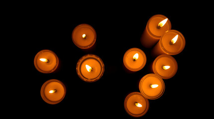 Elegant Warm Candle Glow on Jet Black Background, Bird's Eye View Website Banner, Top-Down Professional Aesthetic