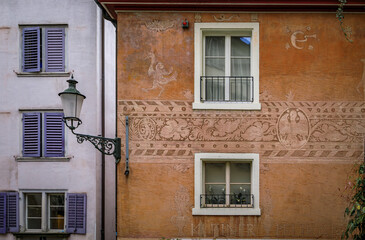 Ornate historic Zurich house with mythical creatures and floral sgraffito art