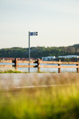Parking sign with scenic mountain background.