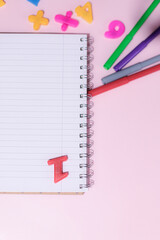 School supplies on a colorful background. Back to school background. Brushes, watercolors, pencils, ballpoint pens