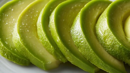 Close up avocado texture on white plate food detail shot
