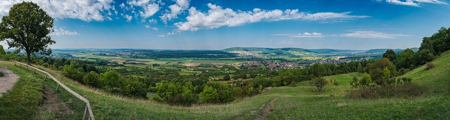 Fototapeta premium Panoramic view from the high plateau of the Ehrenbürg, also called Walberla, one of the three sacred mountains of Franconia, with a view down into the valley