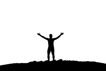 Silhouette of Solitude: The silhouette of a solitary figure, arms outstretched in a gesture of...