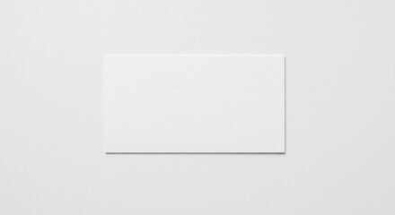 Fototapeta premium Maquette vierge de carte de visite en papier isolée sur fond blanc