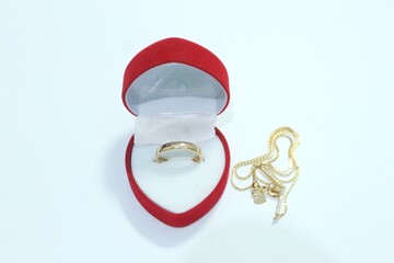 Beautiful gold jewelry. Gold jewelry on a white background.