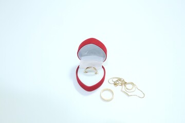 Beautiful gold jewelry. Gold jewelry on a white background.