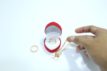 Beautiful gold jewelry. Gold jewelry on a white background.