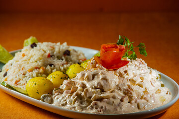 File de peixe, arroz, batatas assadas , tempero verde e maionese de banana