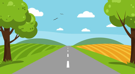 Obraz premium a scenic road stretches through lush green fields under blue sky