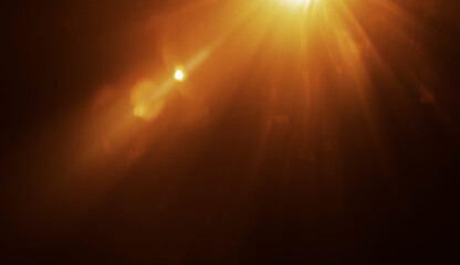 golden sunbeam sunlight beam sunshine sunset bright. Isolated yellow light rays animation. Shine or sun effect on black screen background. Glitter, shiny, bright, flare. orange sunrays, bokeh.