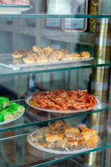 Traditional Spanish and Arabic sweets in shop display. Tarifa. Spain. September 2025.