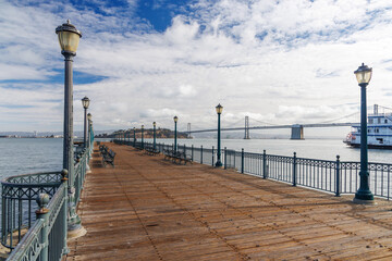 Scenic view of a classic wooden pier stretching into the San Francisco Bay