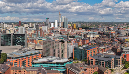 Obraz premium Aerial image of Leeds city centre showing modern skyscrapers, offices, and historic buildings in Yorkshire, England.