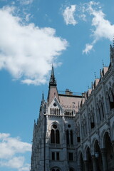 Fototapeta premium The Hungarian Parliament Building, neo-Gothic style, blue sky