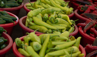 green chili peppers in baskets