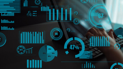 A focused view of a laptop screen featuring business analytics visuals, including graphs and charts for effective data analysis in a modern workspace. Xenic
