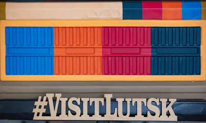 Colorful car with a VISITLUTSK hashtag