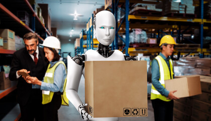 Innovative industry robot working in warehouse together with human worker . Concept of artificial...