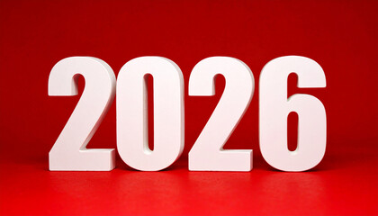 White number 2026 on deep red background. New Year. Gentle shadow adds contrast and dimension
