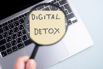 Technology concept - words of digital detox digital gadgets. Concept of social media addiction. Stop using digital gadgets at home and outside of work hours.