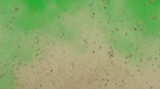 Dust and soil explosion blast effect on green screen background