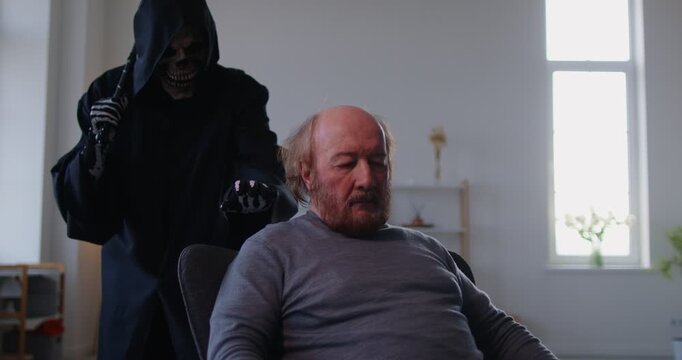 Mystical allegorical eerie figure of Grim Reaper approaches old man in armchair from behind putting hand on his shoulder, making feel end is nigh, symbolizing fate, impending doom and foreboding death