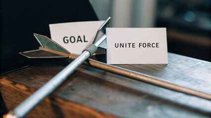Arrow and Cards Representing Goal and Unite Force Concept
