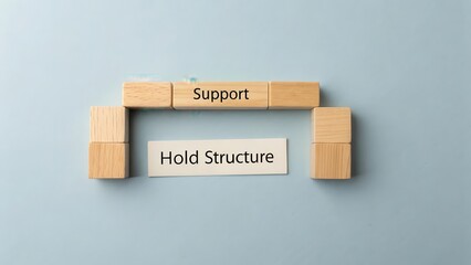Wooden Blocks Forming Support and Hold Structure on Blue Background