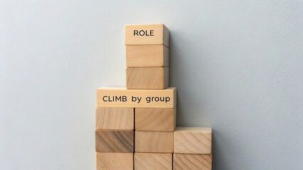 Wooden Blocks Stacked with Words Role and Climb by Group Concept