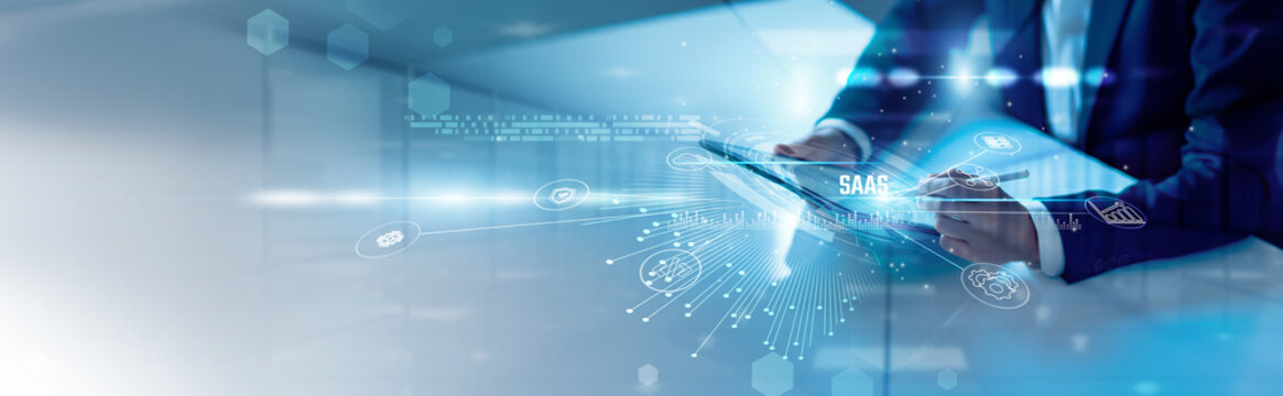 Businessman analysis SaaS and cloud applications, subscription services, collaborative tools, scalable solutions, enterprise software, remote access