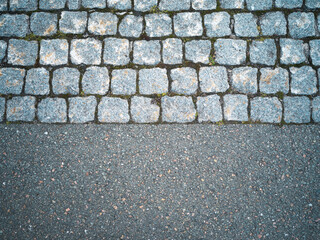 Half on half texture of cobble stone and pavement