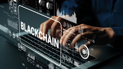 Hands Typing on Laptop with Blockchain Concept Graphics and Data Visualizations in Modern Workspace. Asymptotic smart data analytic.