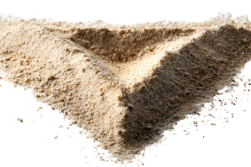 Beige sand pile forming a V shape against black background