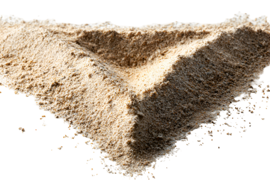 Beige sand pile forming a V shape against black background
