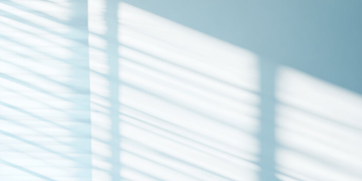 Soft window blinds shadow on wall, sunlight abstract background, bright interior