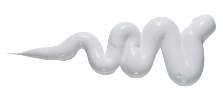 A wavy, curved strip of white thick paint or cream, isolated background.