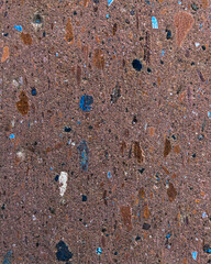 Rough stone surface with colorful mineral fragments –abstract texture background