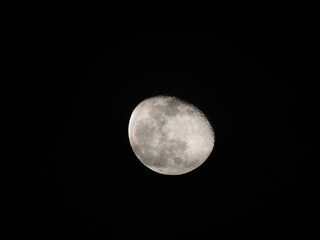 Detailed view of the waxing gibbous Moon against a black sky, showing craters and maria. A sharp, high-contrast astronomical capture.
